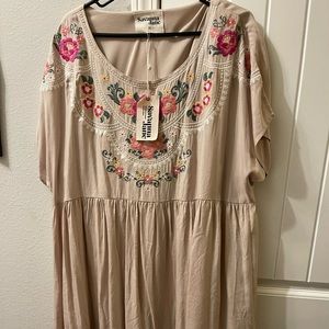 Never worn. Only tried on. Size 2x. Boutique dress.